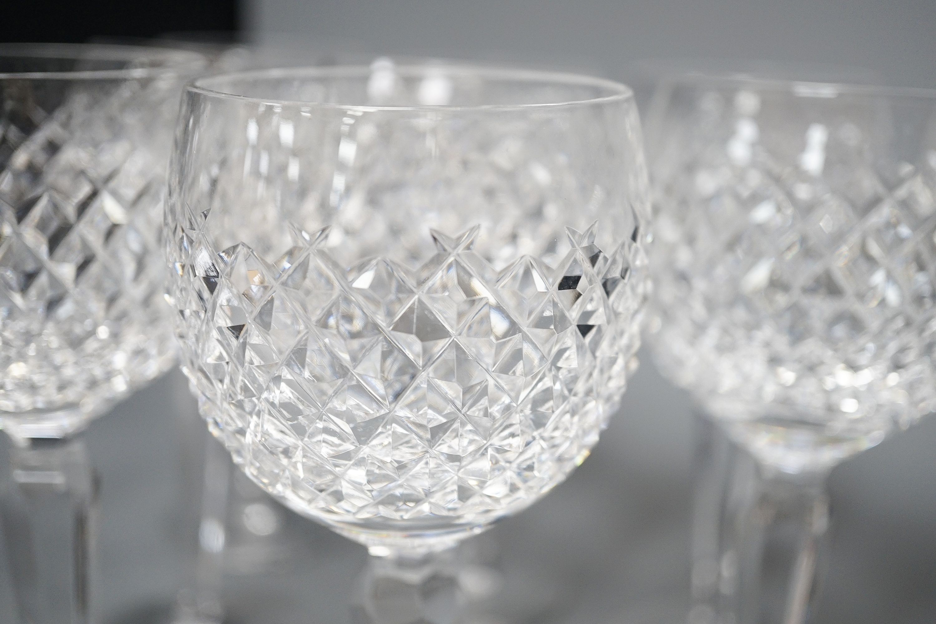 A set of nine Waterford crystal hock glasses, 19cm high